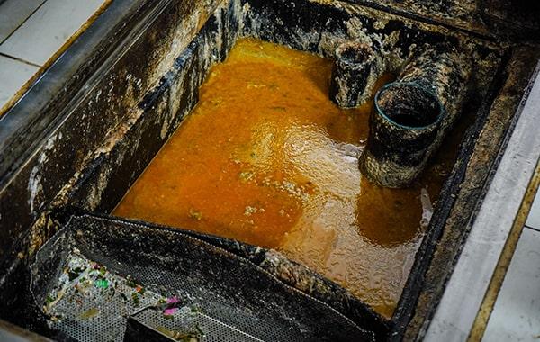 regular grease trap cleaning helps prevent grease and oil from infecting water sources